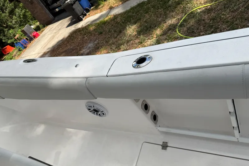 Slide: The Image of 2023 Sea Fox 288 Commander boat interior with speaker and rod holders. - 16