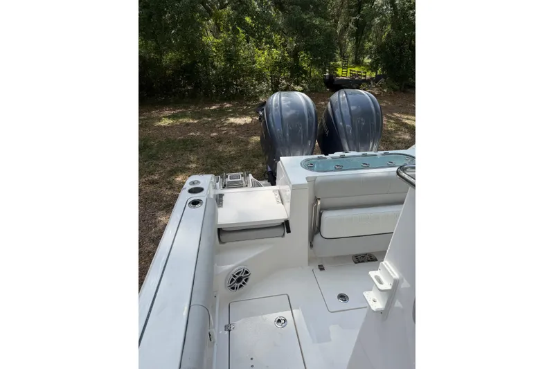 Slide: The Image of 2023 Sea Fox 288 Commander boat with dual engines, viewed from the deck. - 19