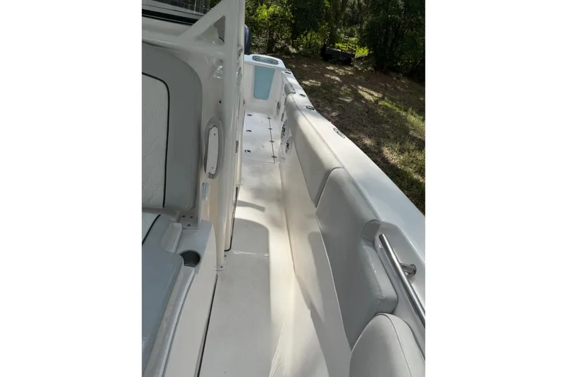 Slide: The Image of 2023 Sea Fox 288 Commander boat interior with seating and storage compartments. - 24