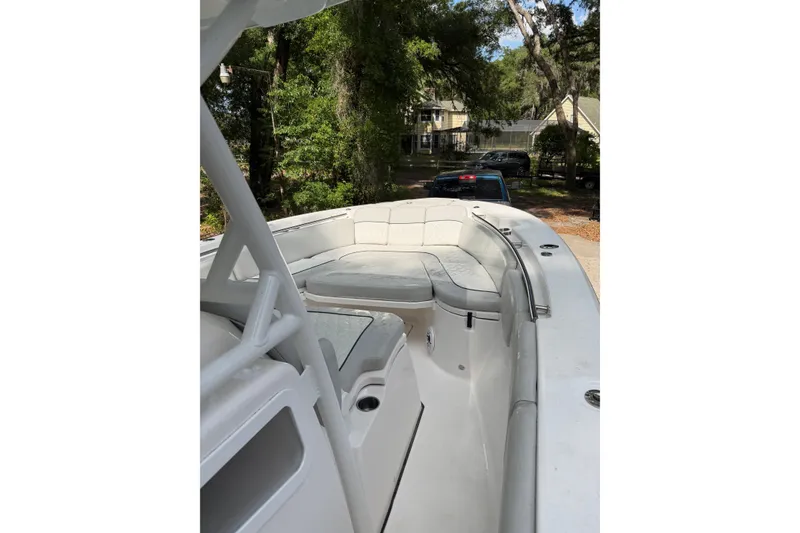 Slide: The Image of 2023 Sea Fox 288 Commander boat interior with cushioned seating and sleek design. - 28