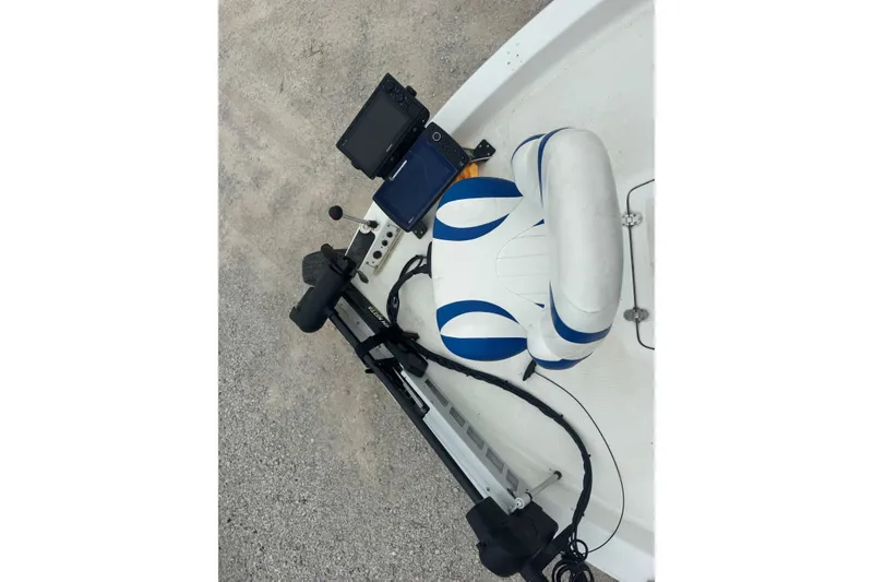 Slide: The Image of 2007 Bay Stealth 2230 boat interior with seat and electronic equipment. - 8