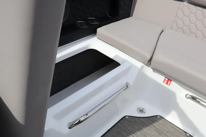 Slide: The Image of Interior view of 2026 Four Winns H4 boat with seating and storage area. - 14
