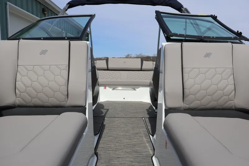 Slide: The Image of Interior view of 2026 Four Winns H4 boat with luxurious seating and modern design. - 26