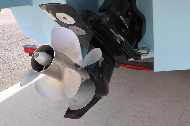 Slide: The Image of 2026 Four Winns H4 boat propeller and outdrive detail. - 5