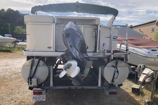 Slide: The Image of 2010 Sweetwater Tuscany 2086 pontoon boat with outboard motor on trailer. - 6