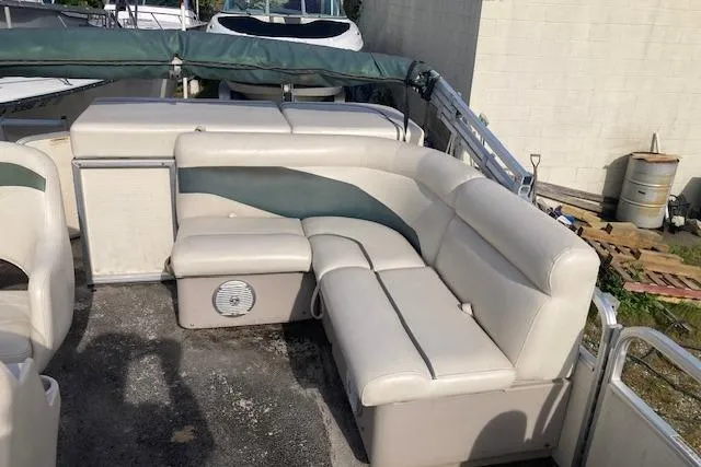 Slide: The Image of Pontoon boat interior with white seating, Sweetwater Tuscany 2086, 2010 model. - 8