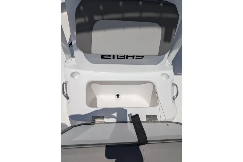Slide: The Image of 2026 Clearwater 21 Bay boat interior with storage compartment and seating. - 7
