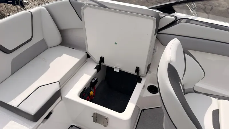 Slide: The Image of The image shows the interior of a Yamaha AR220 boat with an open storage compartment. - 20