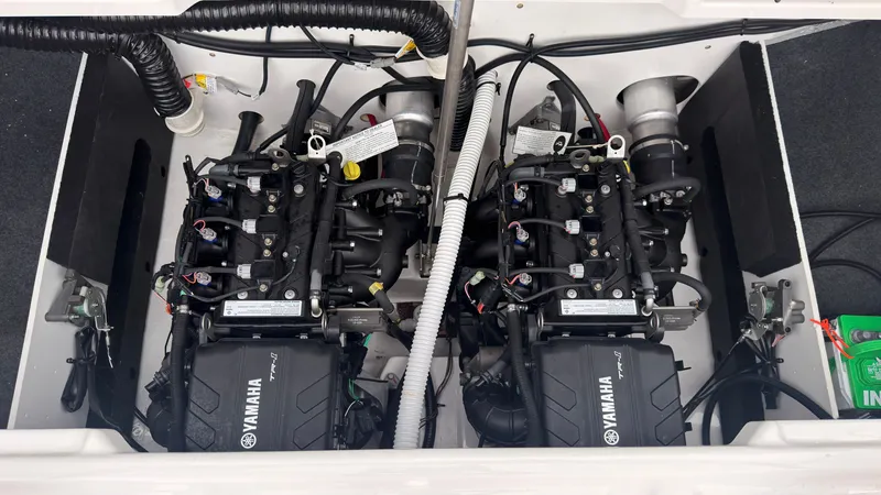 Slide: The Image of The engine compartment of a Yamaha AR220 boat with two powerful engines. - 15