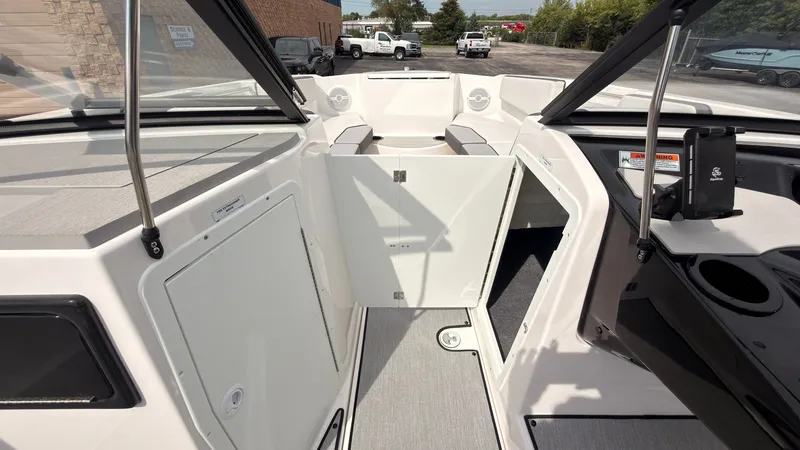 Slide: The Image of The image shows the cockpit of a 2026 Yamaha AR220 with an open door to the cabin. - 32
