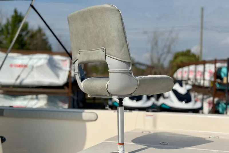 Slide: The Image of Boat seat on a 2026 Carolina Skiff 21 LS, outdoor setting. - 2