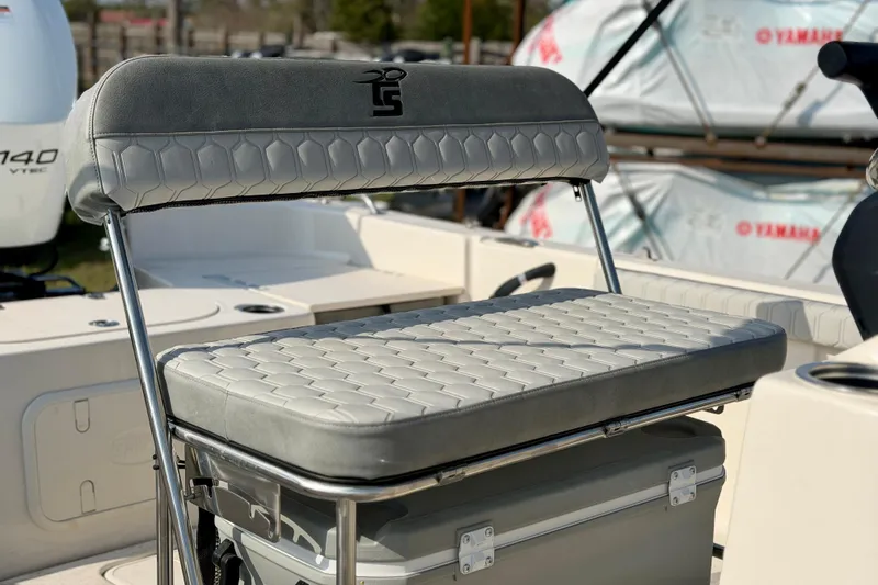 Slide: The Image of 2026 Carolina Skiff 21 LS boat seat with stylish gray upholstery and sturdy metal frame. - 3