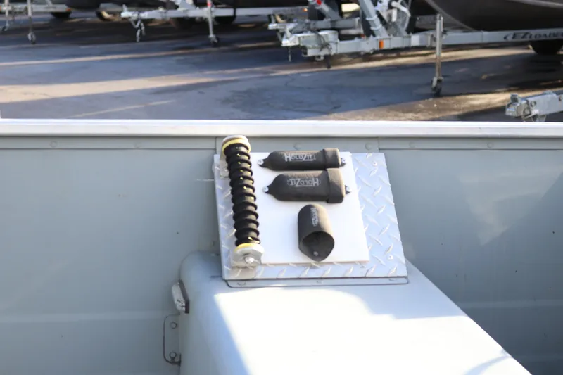 Slide: The Image of 2016 Smoker Craft Alaskan 15 boat interior with mounted accessories. - 11