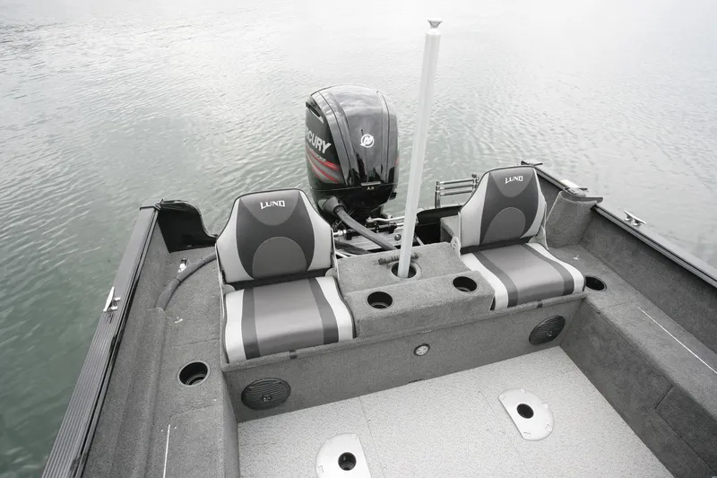 Slide: The Image of Manufacturer Provided Image: 2018 Lund 1650 Rebel XS Tiller boat interior with Mercury outboard motor. - 14