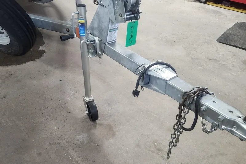 Slide: The Image of Trailer hitch of 2018 Lund 1650 Rebel XS Tiller with chains and wheel jack. - 5