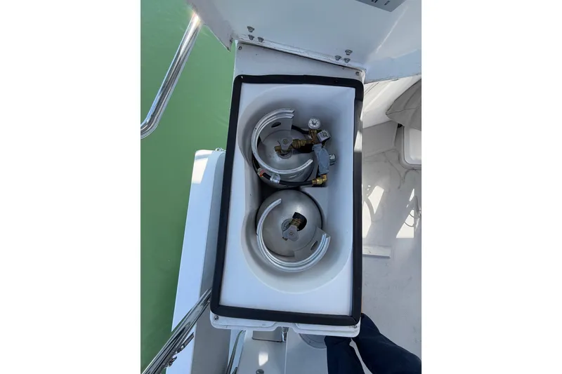 Slide: The Image of Storage compartment with propane tanks on a 2023 Catalina 425 boat. - 11