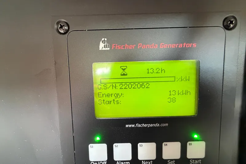 Slide: The Image of Fischer Panda generator display showing runtime, energy usage, and serial number on Catalina 425, 2023. - 39