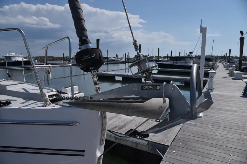 Slide: The Image of 2023 Catalina 425 sailboat with Rocna anchor docked at marina under clear sky. - 4
