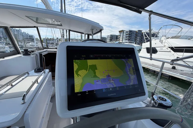 Slide: The Image of Cockpit of 2023 Catalina 425 sailboat with Garmin navigation display at marina. - 9