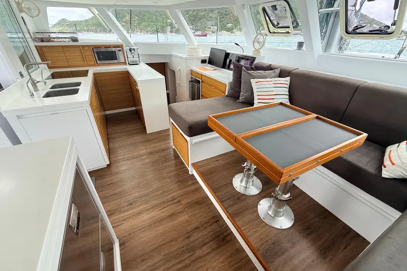 Slide: The Image of Luxurious interior of 2021 Balance 526 yacht with modern kitchen and seating area. - 10
