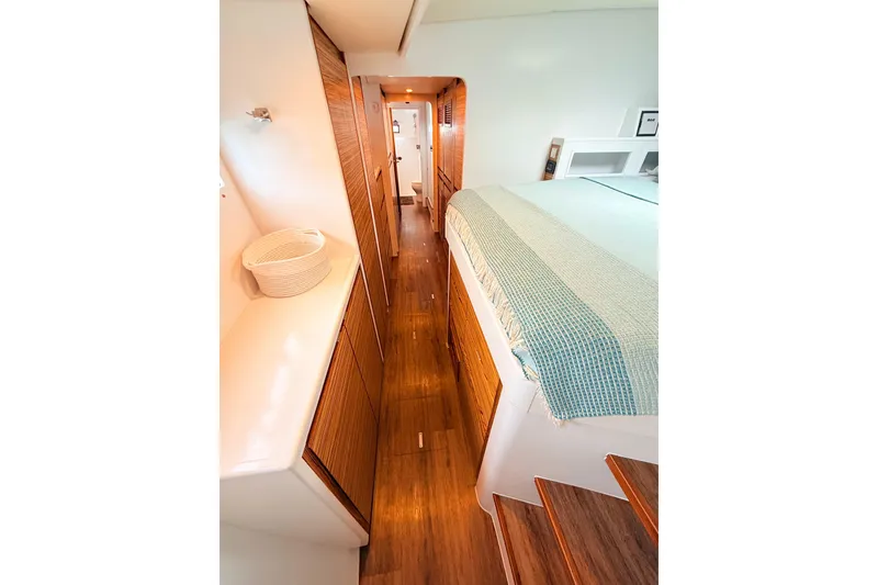 Slide: The Image of Luxurious interior of 2021 Balance 526 yacht with wooden flooring and cozy bedding. - 15