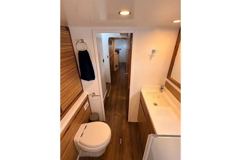 Slide: The Image of Modern bathroom in 2021 Balance 526 yacht with wood accents and sleek fixtures. - 20