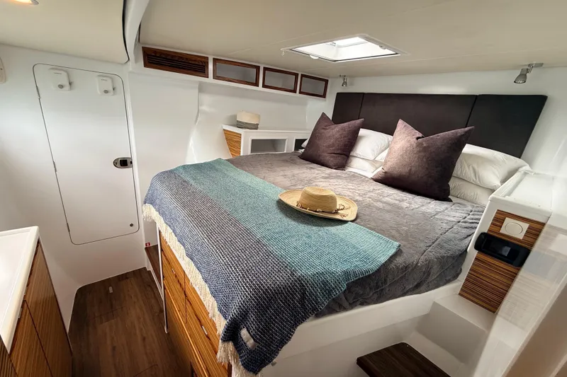 Slide: The Image of Luxurious cabin interior of 2021 Balance 526 yacht with cozy bed and stylish decor. - 21