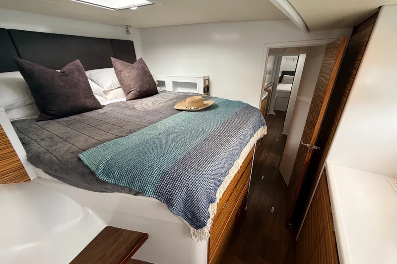 Slide: The Image of Luxurious bedroom interior of 2021 Balance 526 yacht with cozy bedding and modern design. - 22