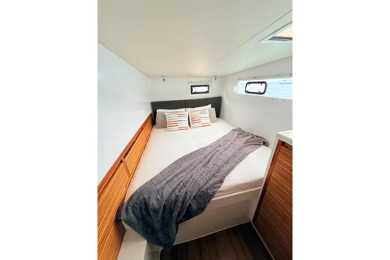 Slide: The Image of Cozy cabin bedroom in 2021 Balance 526 yacht with modern decor and natural light. - 23