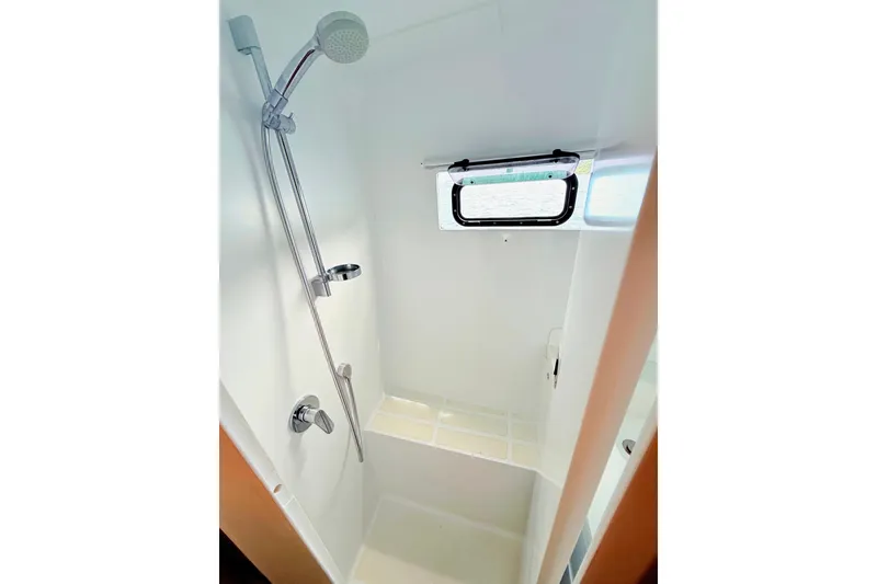 Slide: The Image of Compact shower area in 2021 Balance 526 yacht with modern fixtures and window. - 25