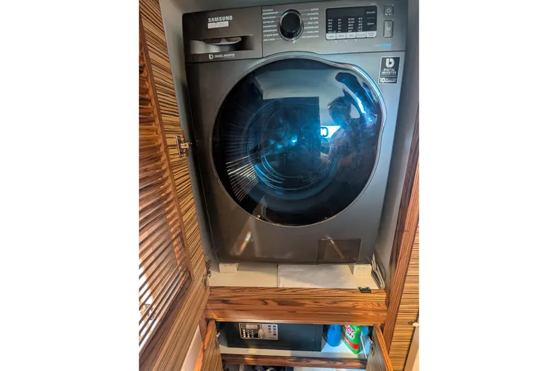 Slide: The Image of Front-loading Samsung washing machine in a wooden cabinet, Balance model 526, year 2021. - 26