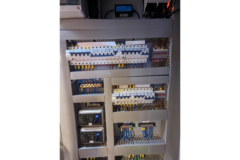 Slide: The Image of Electrical panel with circuit breakers and wiring, Balance 526 model, 2021. - 30