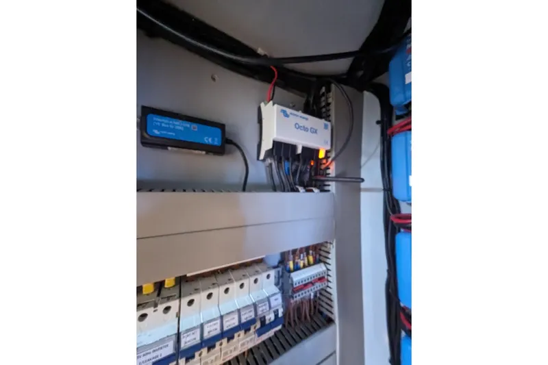Slide: The Image of Electrical panel with Balance 526 components, featuring Octo GX and wiring, 2021 model. - 31