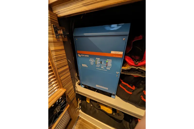 Slide: The Image of Blue electrical inverter in a wooden cabinet, Balance 526 model, 2021. - 32