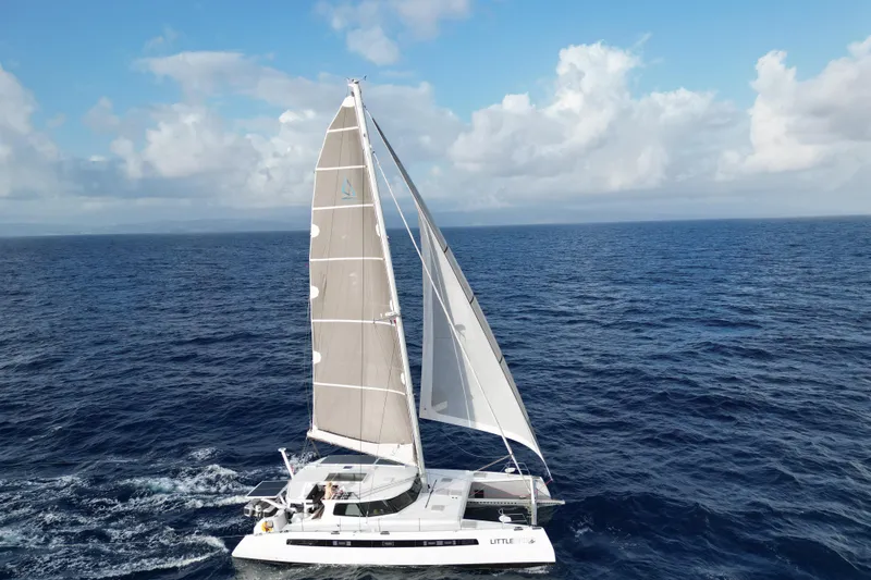 Slide: The Image of Sailing catamaran Balance 526, 2021 model, cruising on open ocean under clear skies. - 43