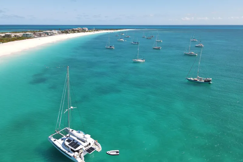 Slide: The Image of Aerial view of sailboats anchored in turquoise waters near a sandy beach, Balance 526 model. - 45