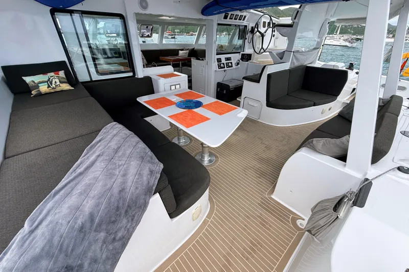 Slide: The Image of Luxurious interior of 2021 Balance 526 yacht with modern seating and dining area. - 6
