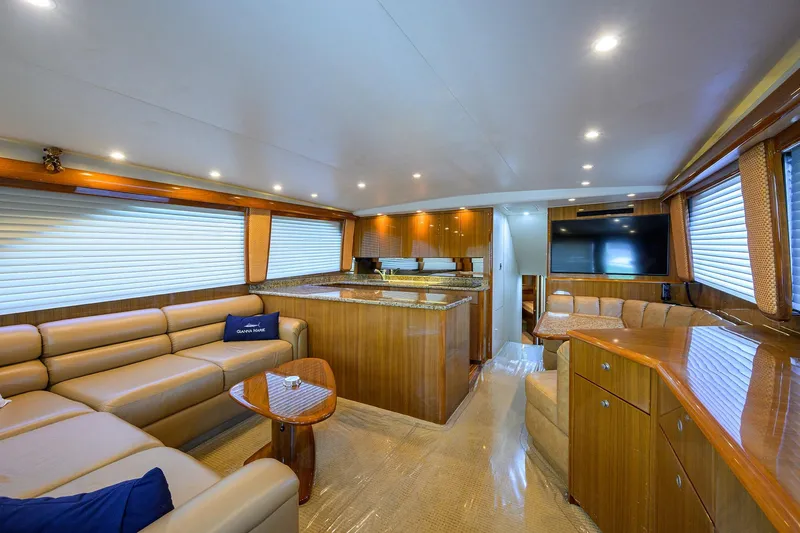 Slide: The Image of Luxurious interior of a 2007 Viking 56 Convertible yacht with elegant seating and modern amenities. - 38