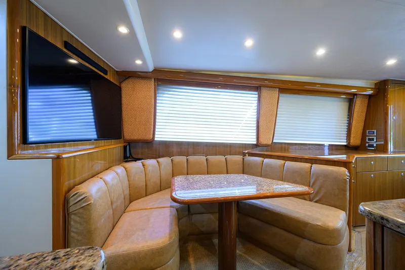 Slide: The Image of Luxurious interior of 2007 Viking 56 Convertible yacht with plush seating and modern amenities. - 43