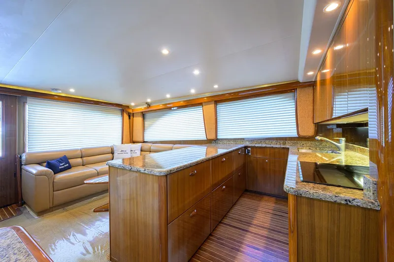 Slide: The Image of Luxurious interior of 2007 Viking 56 Convertible yacht with elegant wood finishes and modern amenities. - 47
