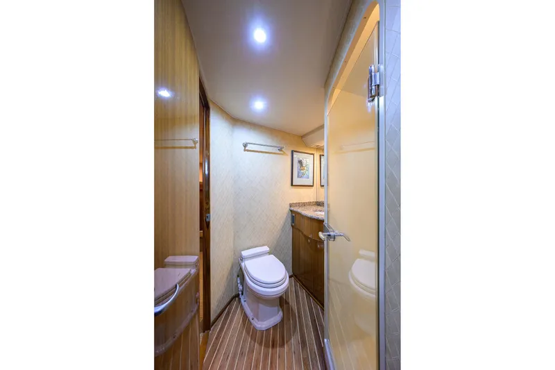 Slide: The Image of Luxurious bathroom interior of 2007 Viking 56 Convertible yacht with modern fixtures. - 69