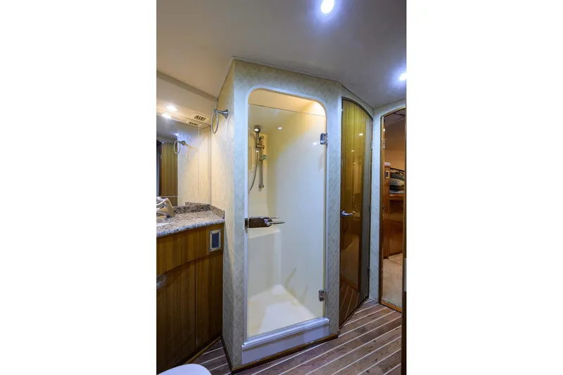 Slide: The Image of Luxurious bathroom interior of 2007 Viking 56 Convertible yacht with glass shower. - 71