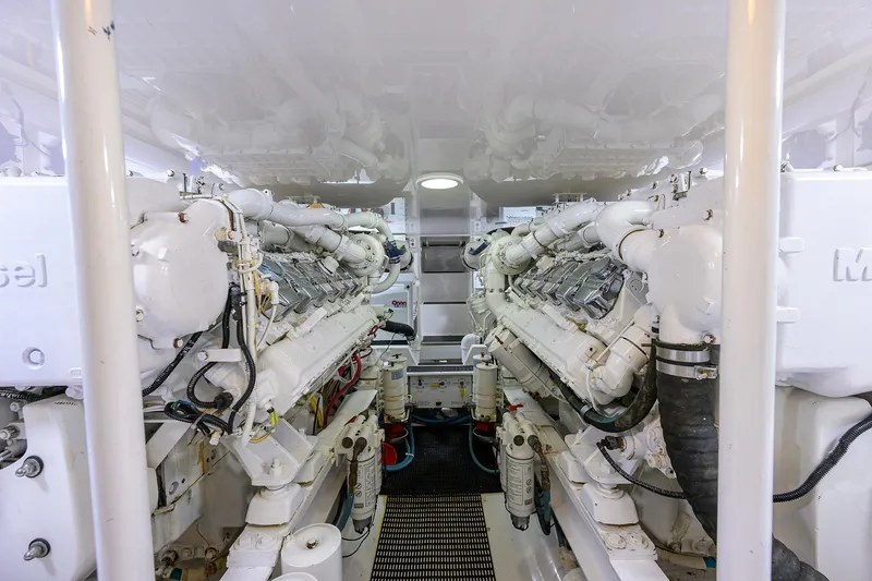 Slide: The Image of Engine room of 2007 Viking 56 Convertible yacht, featuring dual diesel engines. - 72