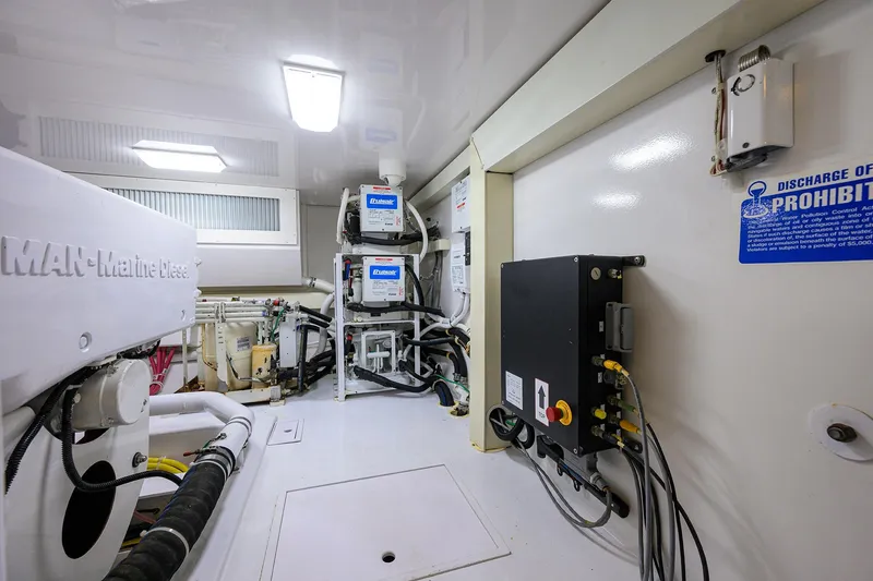 Slide: The Image of Engine room of 2007 Viking 56 Convertible yacht with MAN marine diesel engine. - 73