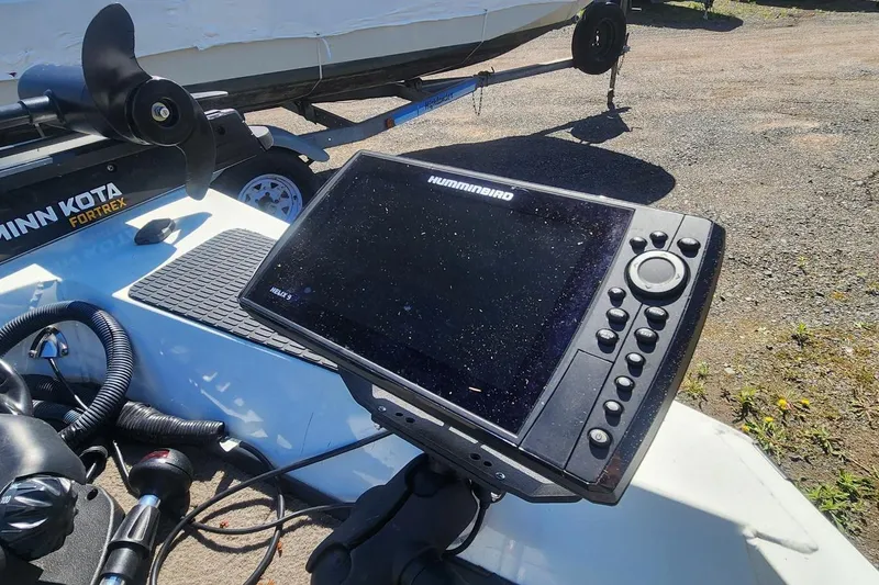 Slide: The Image of Fishfinder on 2008 Triton VT 19 boat with Minn Kota Fortrex trolling motor. - 5