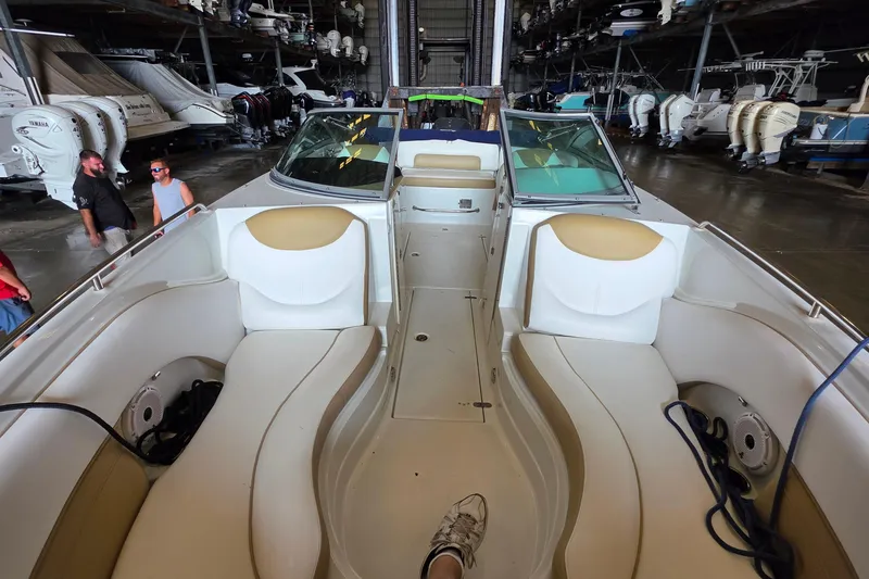 Slide: The Image of Interior view of a 2012 SouthWind 2400 SD boat in a storage facility. - 20