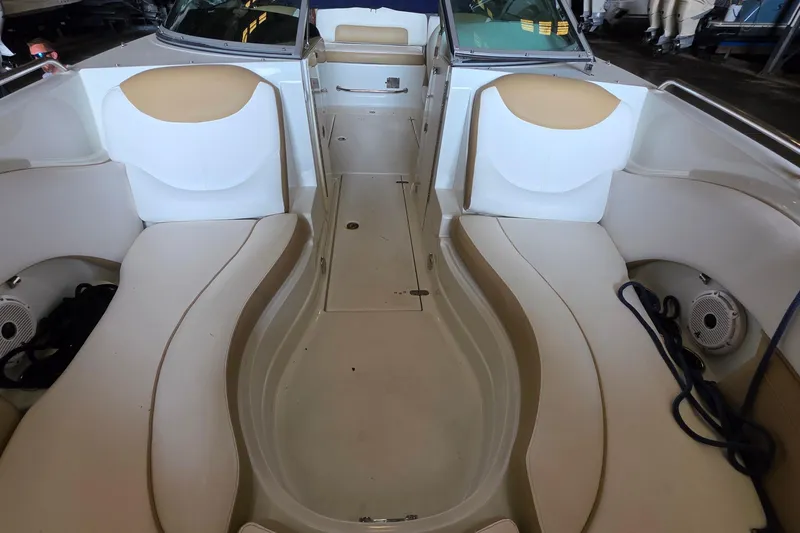 Slide: The Image of Interior view of 2012 SouthWind 2400 SD boat with beige seating. - 23