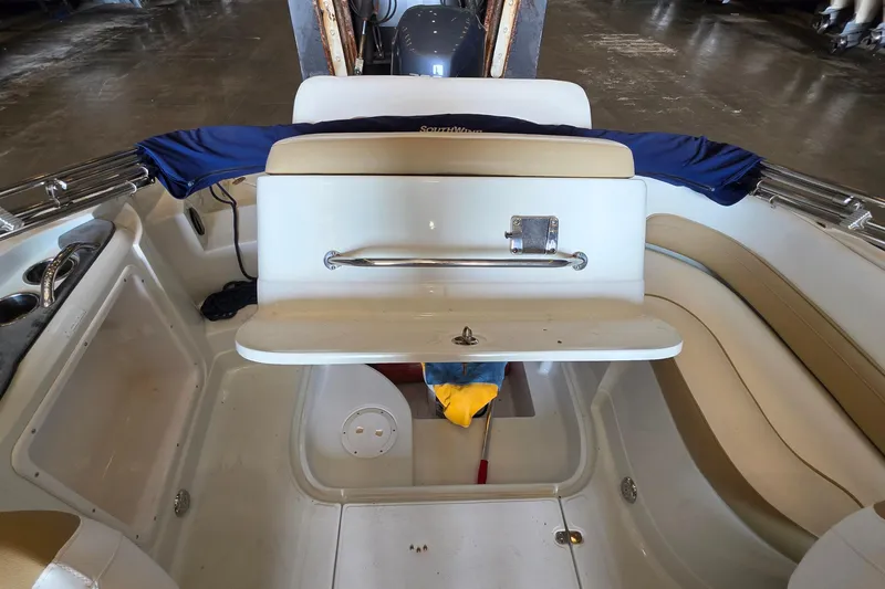 Slide: The Image of 2012 SouthWind 2400 SD boat interior with seating and storage compartments. - 32