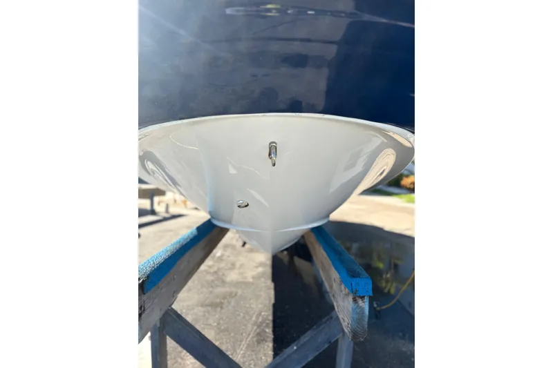 Slide: The Image of 2012 SouthWind 2400 SD boat hull on a stand, viewed from the front. - 7