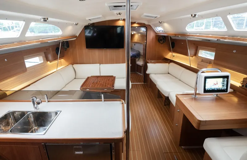 Slide: The Image of Luxurious interior of 2024 Catalina 445 yacht with modern amenities and elegant wood finish. - 2